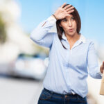 cool young woman with thermometer